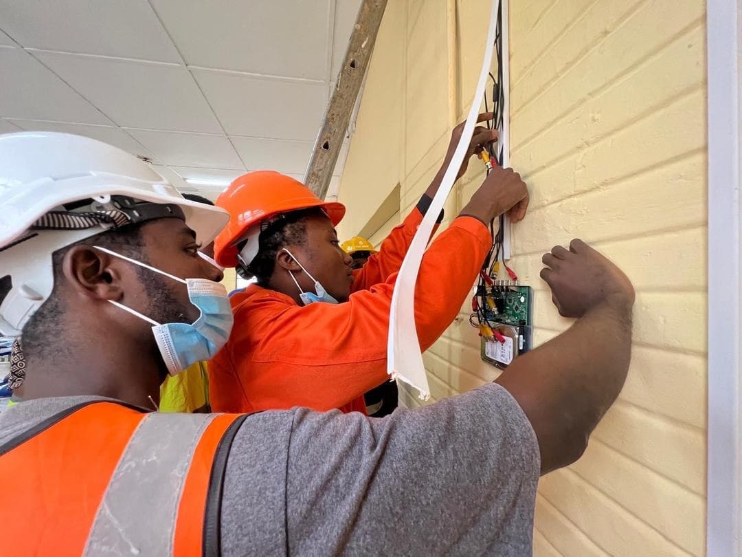 Electrical workers in safety gear